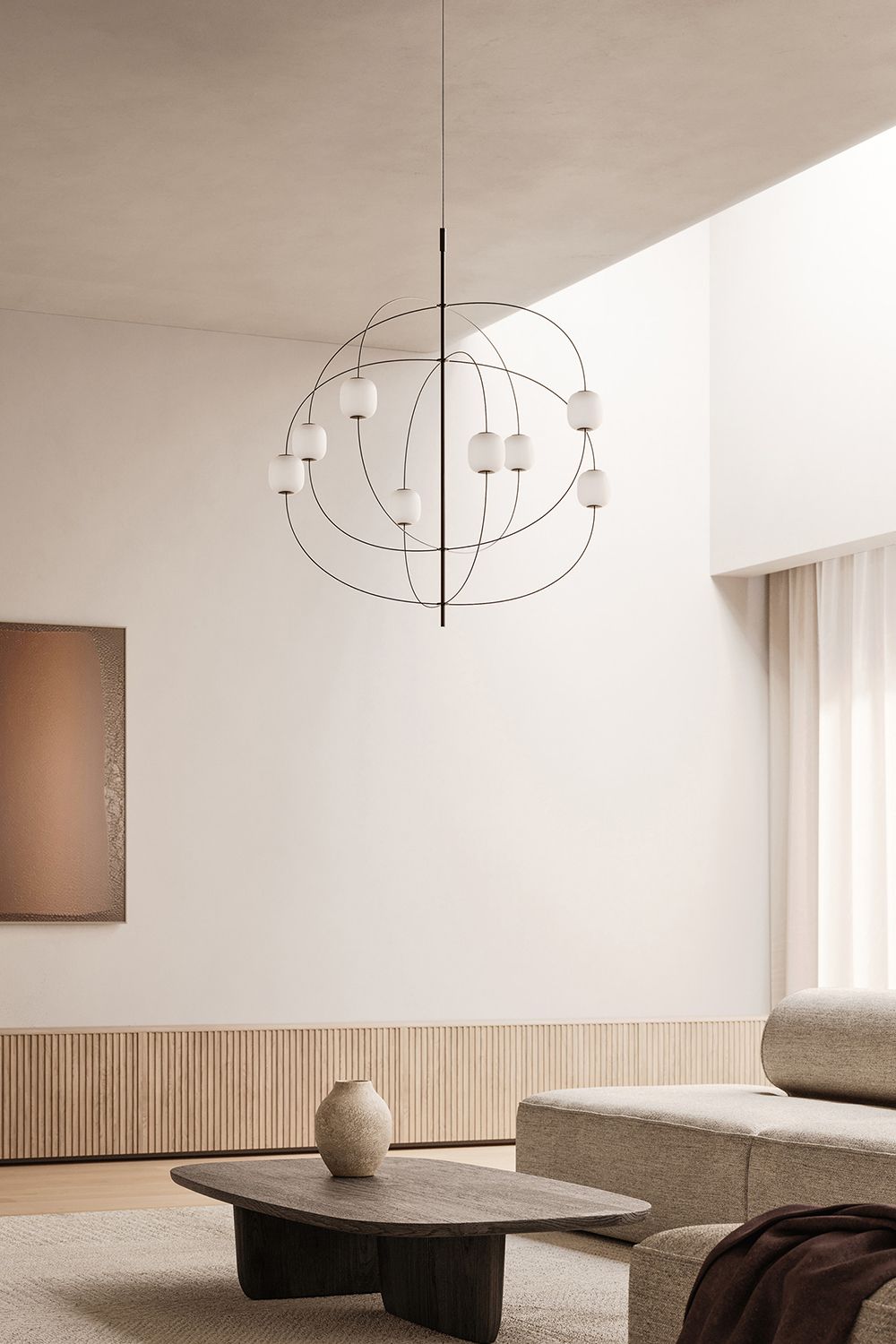 Axia pendel fra Lodes i en stue.