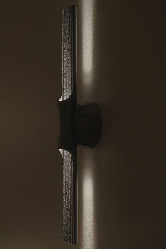 Nærbilde av dekorativ vegglampe i bolig i Bykronen i Stavanger